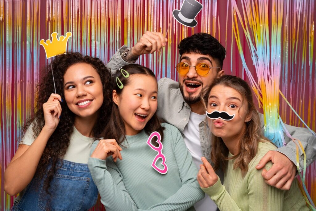 How to Make the Most of an Inexpensive Photo Booth Rental 3 medium shot friends posing photo booth 23 2150191513