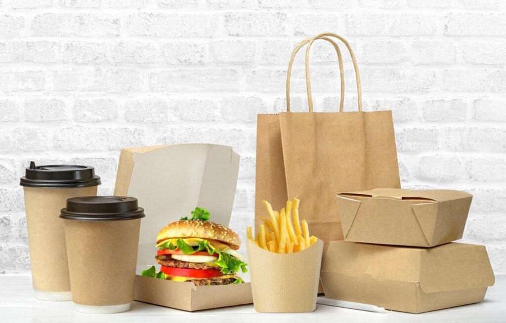 First Impression Mastery – Custom Boxes That Hook Buyers Instantly! 3 fast food big lunch set tasty hamburger french fries paper coffee cups brown paper bag box table isolated white background 434420 1005 transformed 1024x655 1